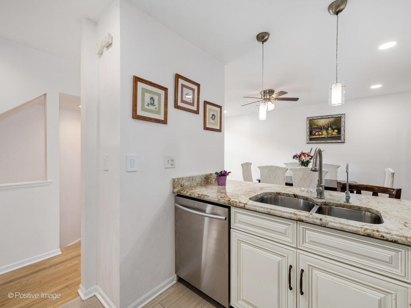 2393 North Wayne Avenue Chicago, IL 60614 - Photo 5 of 24 a kitchen with a sink and a refrigerator