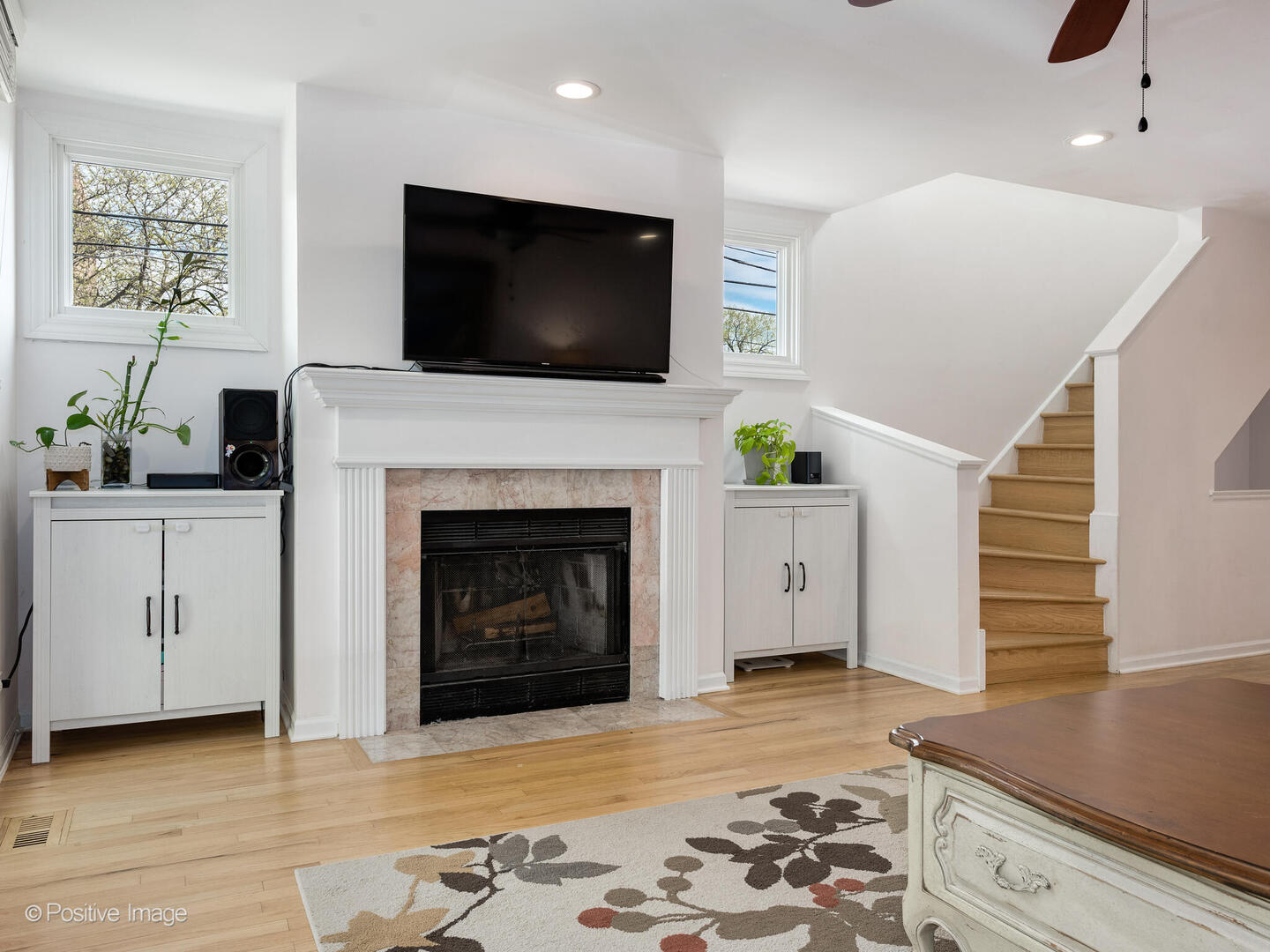 2393 North Wayne Avenue Chicago, IL 60614 - Photo 10 of 24 a living room with furniture and a fireplace