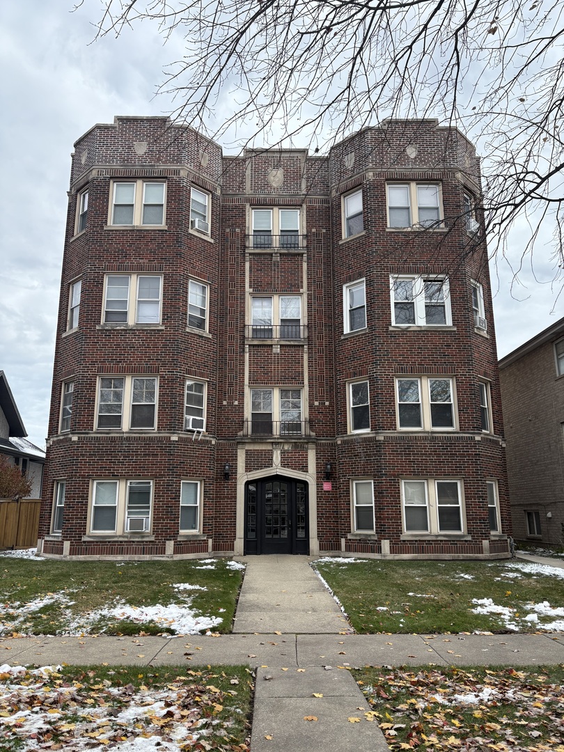 3245 Wisconsin Avenue, Unit 1S Berwyn, IL 60402 - Photo 1 of 10 a front view of residential building