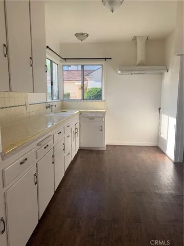 a view of a kitchen with a sink