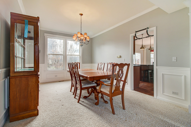 3 Firethorn Court Bolingbrook, IL 60490 - Photo 12 of 39 a dining room with furniture and window