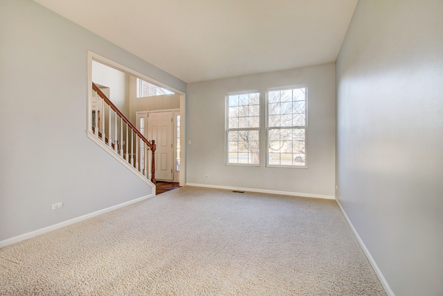 3 Firethorn Court Bolingbrook, IL 60490 - Photo 16 of 39 an empty room with windows