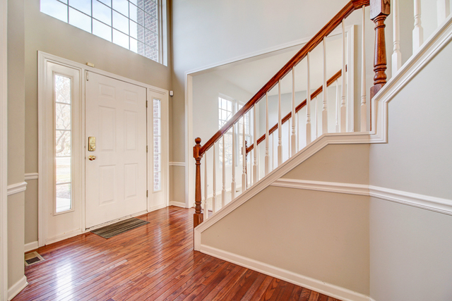 3 Firethorn Court Bolingbrook, IL 60490 - Photo 17 of 39 a view of an entryway with wooden floor