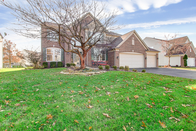 3 Firethorn Court Bolingbrook, IL 60490 - Photo 3 of 39 a front view of a house with a yard and trees
