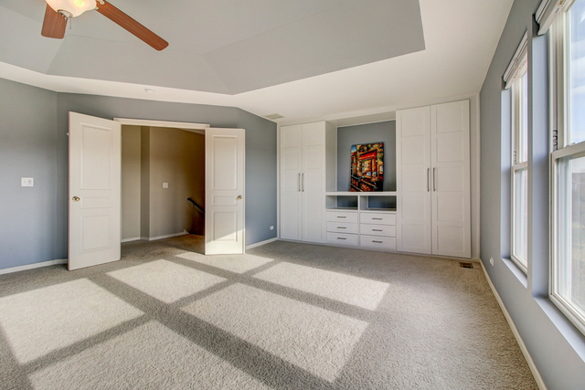 3 Firethorn Court Bolingbrook, IL 60490 - Photo 24 of 39 an empty room with windows and closet