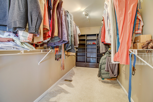 3 Firethorn Court Bolingbrook, IL 60490 - Photo 27 of 39 a view of walk in closet with clothes and shoes