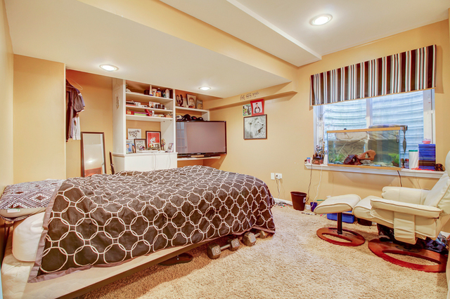 3 Firethorn Court Bolingbrook, IL 60490 - Photo 35 of 39 a bedroom with a bed and a dresser in it