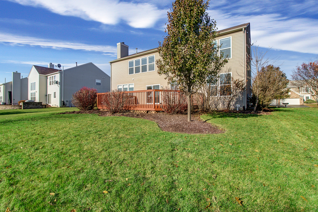 3 Firethorn Court Bolingbrook, IL 60490 - Photo 36 of 39 a front view of a house with a yard and trees