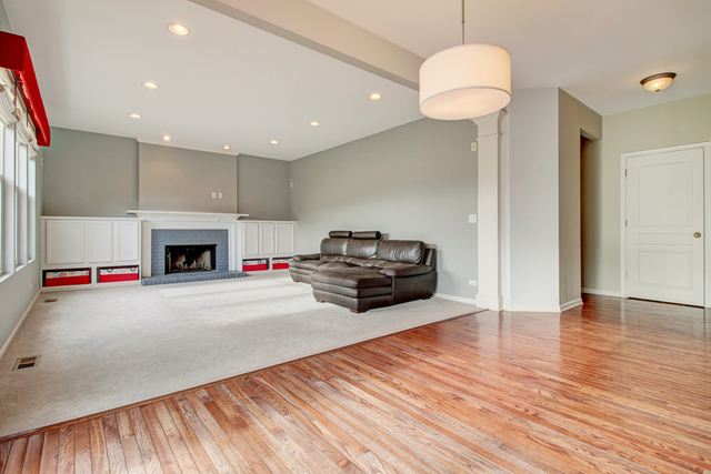 3 Firethorn Court Bolingbrook, IL 60490 - Photo 5 of 39 a living room with furniture and a fireplace