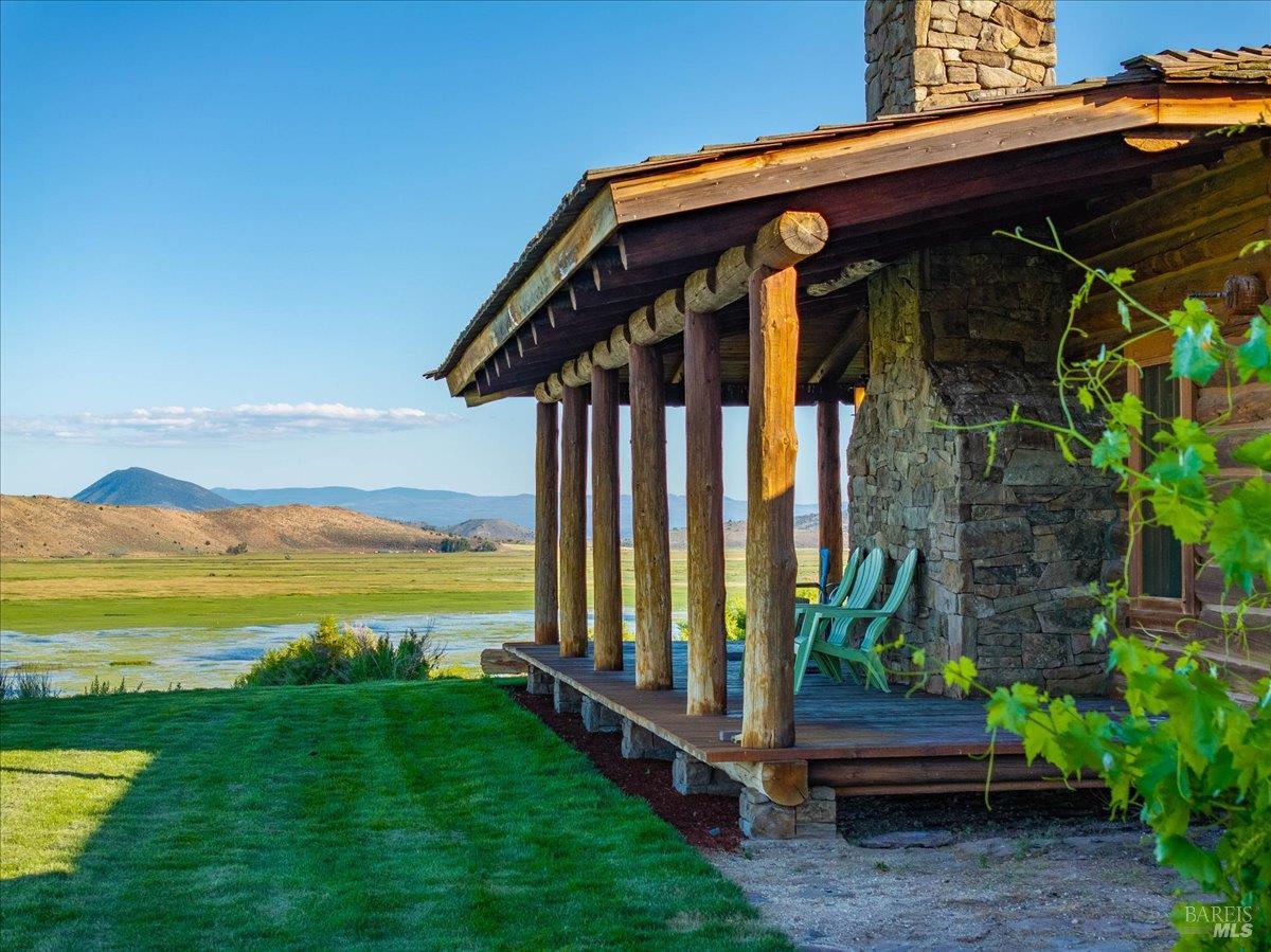 3034 State Line Road Klamath Falls, CA 97603 - Photo 34 of 42 a view of a backyard with hardwood