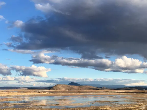 a view of lake with mountain