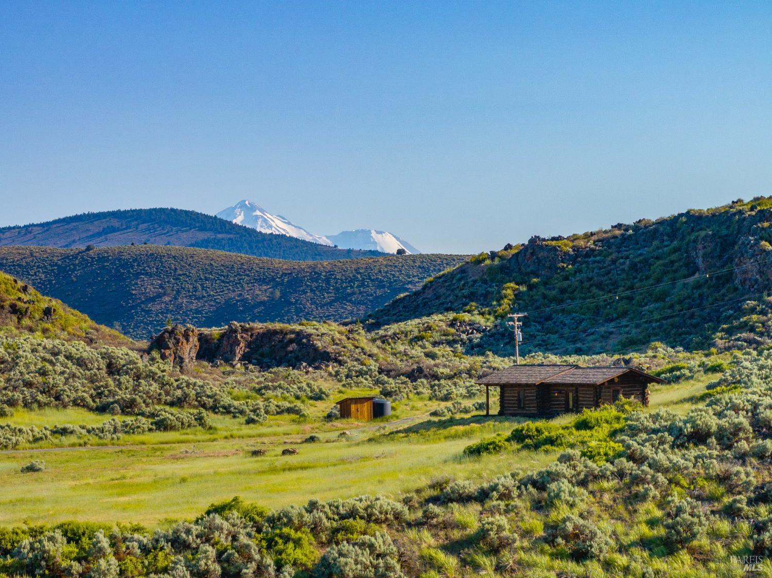 3034 State Line Road Klamath Falls, CA 97603 - Photo 5 of 42 a view of a house with a big yard