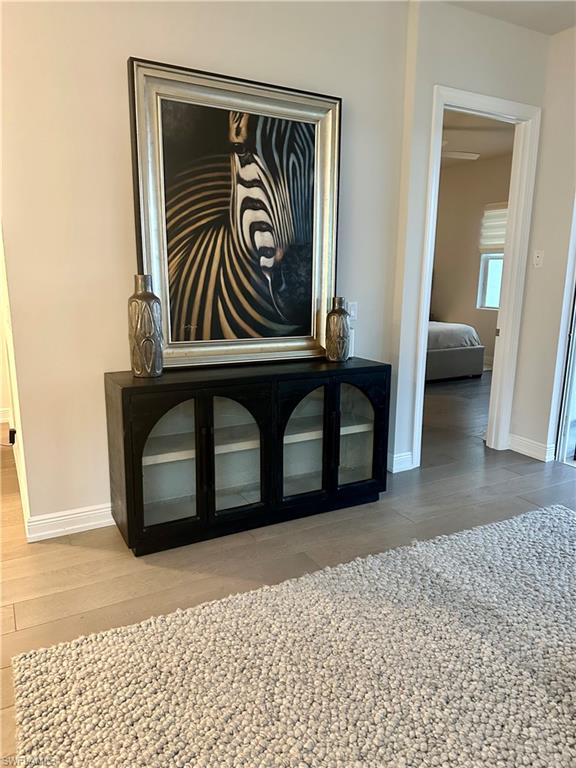 9179 Cayman Drive Naples, FL 34114 - Photo 15 of 50 a view of a door and a rug