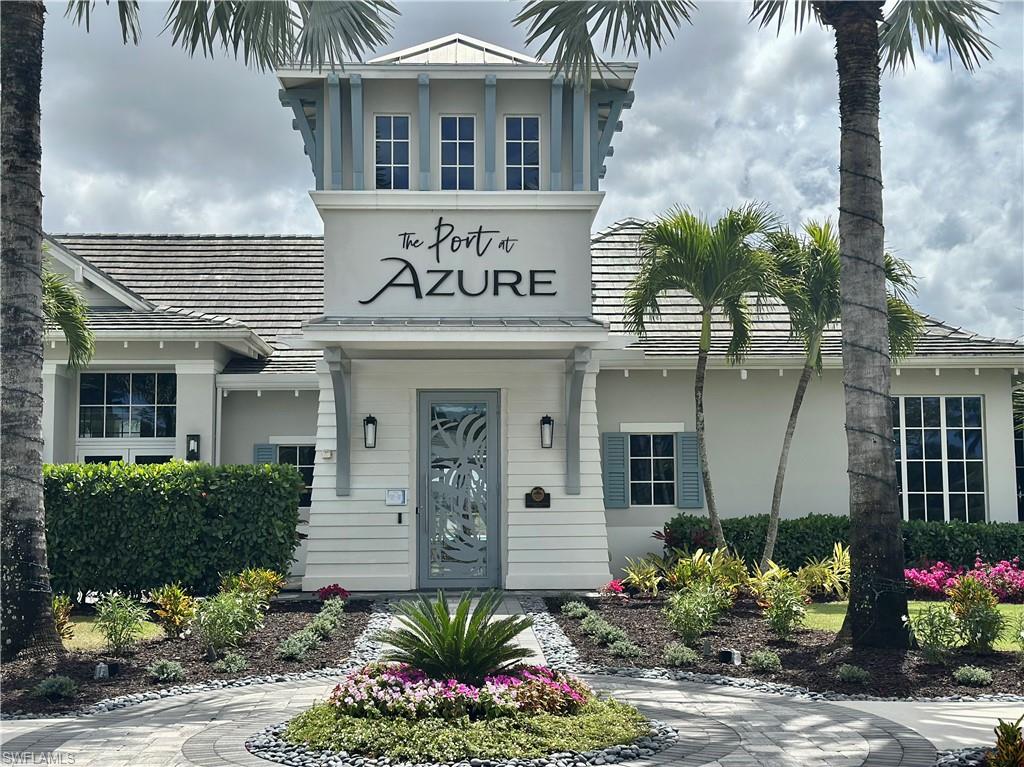 9179 Cayman Drive Naples, FL 34114 - Photo 32 of 50 front view of a house with potted plants