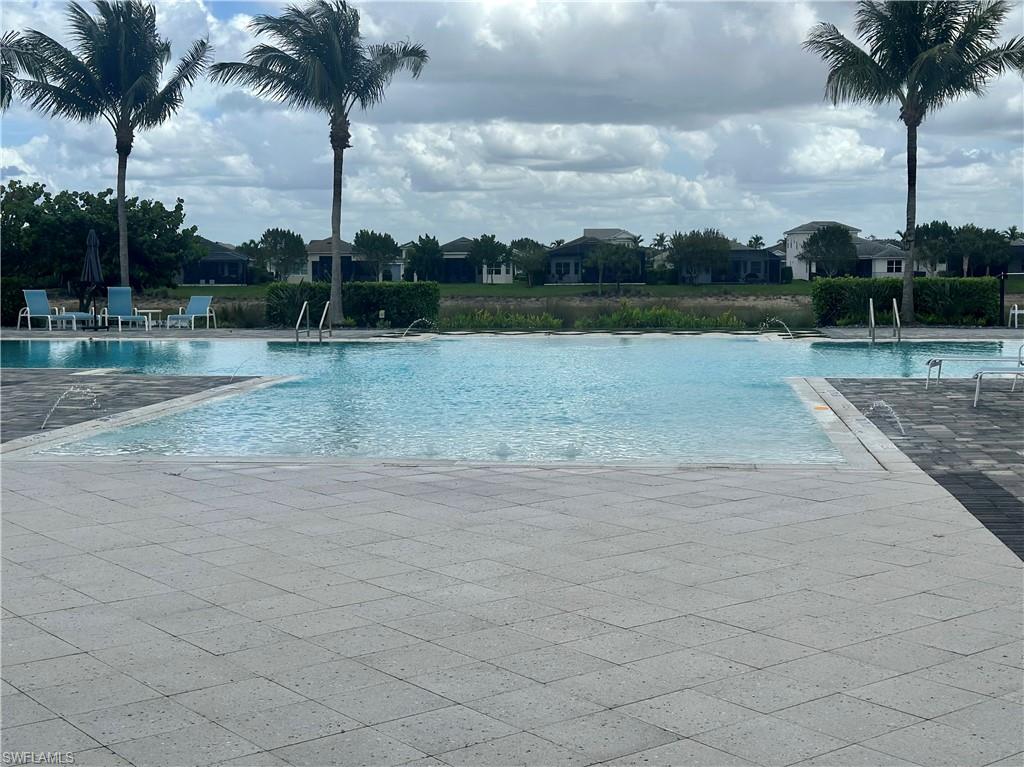 9179 Cayman Drive Naples, FL 34114 - Photo 33 of 50 a view of a yard