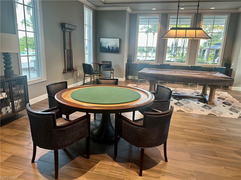 9179 Cayman Drive Naples, FL 34114 - Photo 46 of 50 a dining room with furniture and window