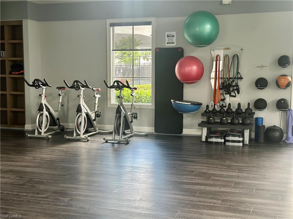 9179 Cayman Drive Naples, FL 34114 - Photo 50 of 50 a view of a room with wooden floor