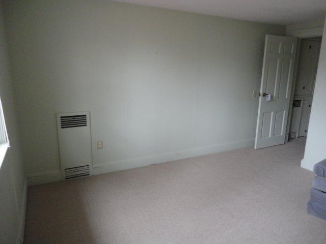 9 Kelley Road Hyannis, MA 02601 - Photo 16 of 18 an empty room and a window