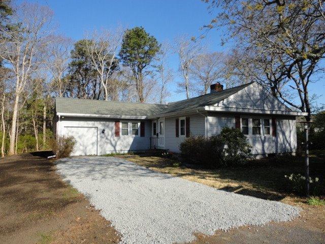 9 Kelley Road Hyannis, MA 02601 - Photo 2 of 18 a front view of a house with a yard