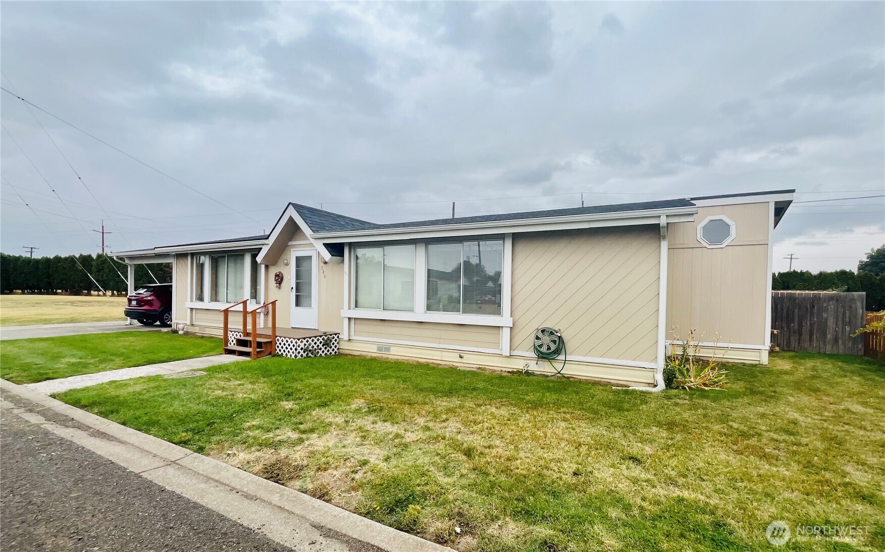 front view of a house with a yard