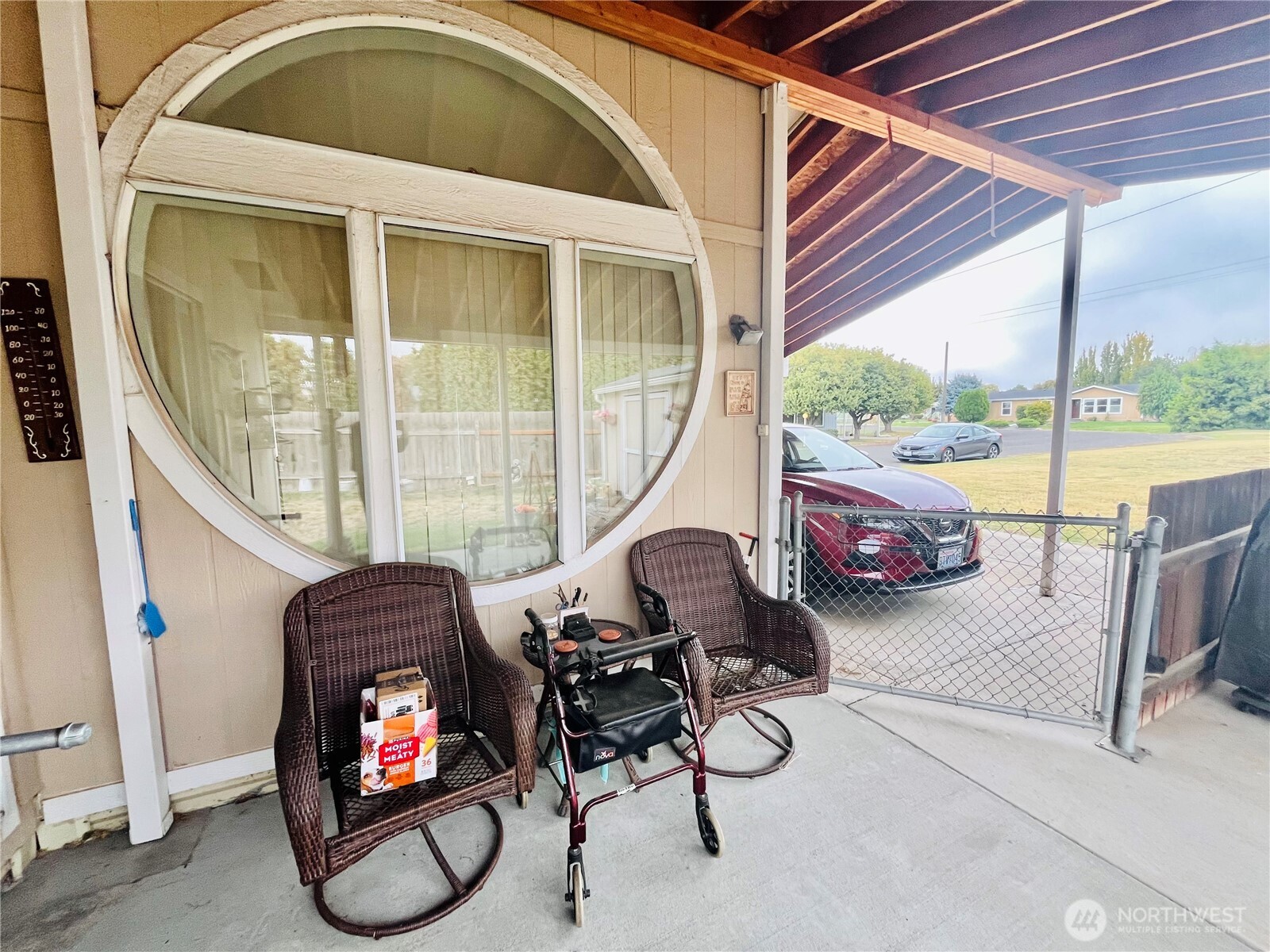 840 Northeast Karol Loop Walla Walla, WA 99362 - Photo 14 of 17 a living room with furniture and a floor to ceiling window