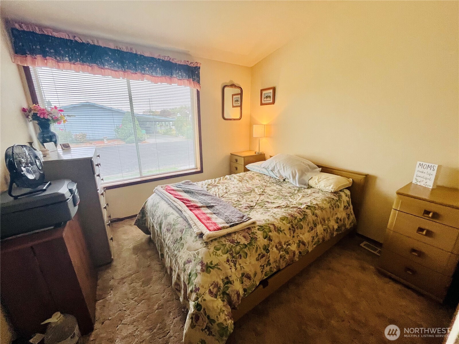 840 Northeast Karol Loop Walla Walla, WA 99362 - Photo 9 of 17 a bedroom with a bed and large window