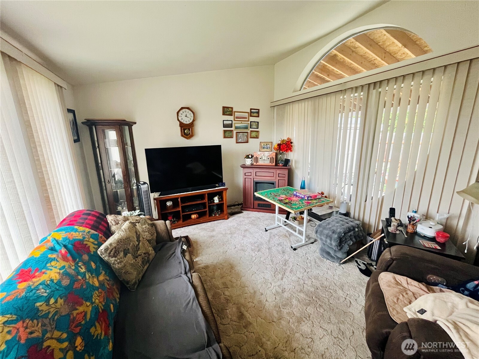 840 Northeast Karol Loop Walla Walla, WA 99362 - Photo 10 of 17 a living room with furniture and a flat screen tv