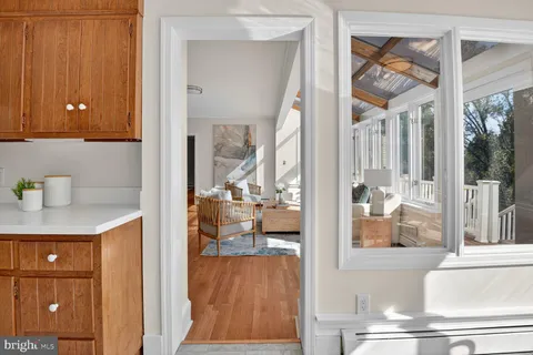 a view of a living room and entry way