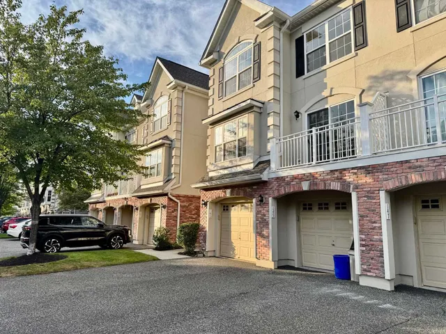 a view of a building with a street