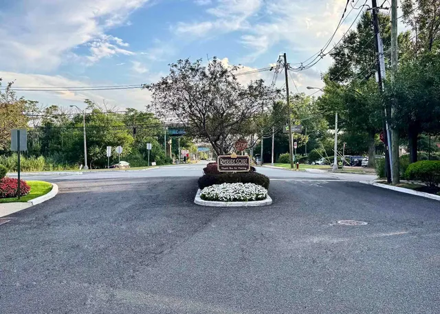 a view of a park with swings and slides