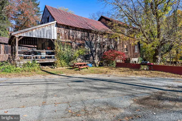 a view of a house with sitting area and furniture