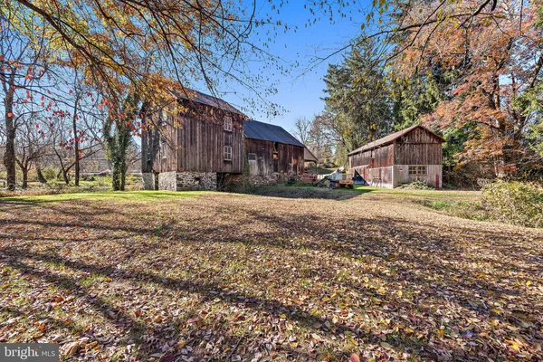 a view of large house with a yard