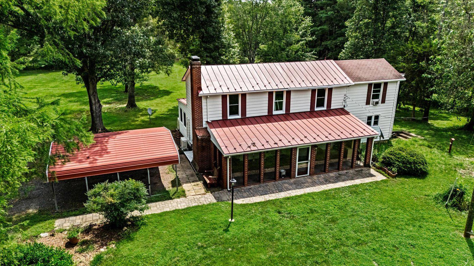 31934 Indiantown Road Locust Grove, VA 22508 - Photo 2 of 84 Those big trees are gorgeous from the back deck.