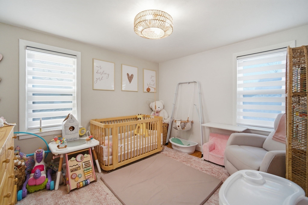 26 Cuff Avenue Springfield, MA 01104 - Photo 14 of 26 a bedroom with furniture and a window