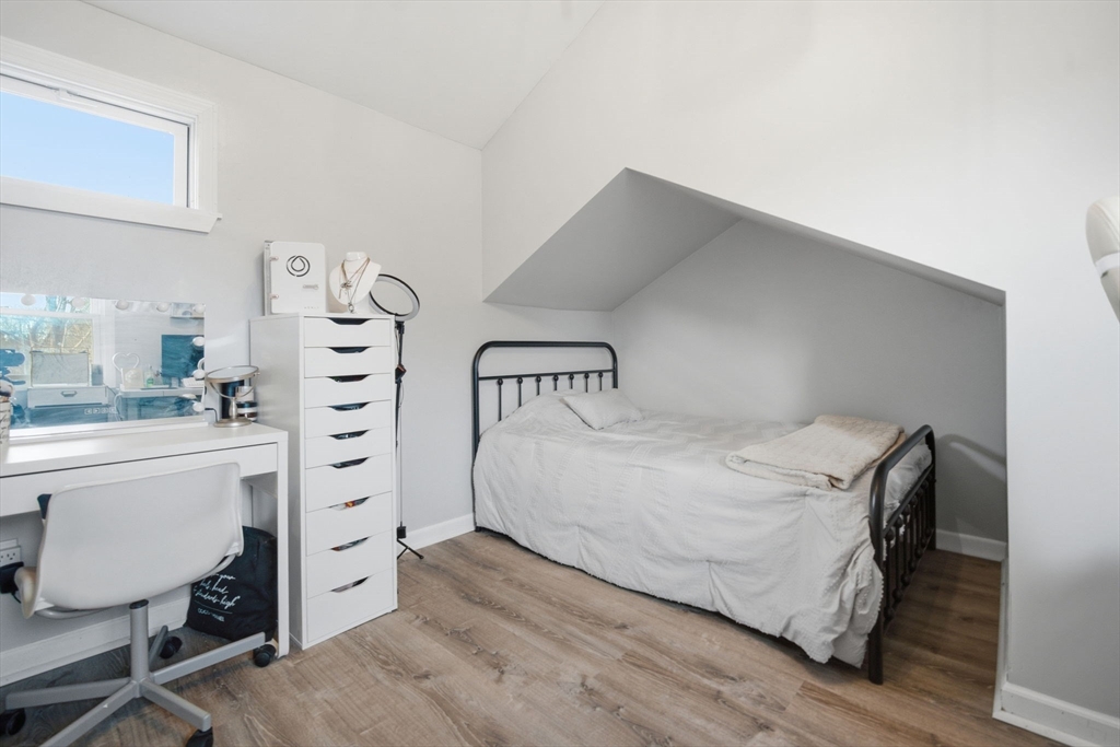 26 Cuff Avenue Springfield, MA 01104 - Photo 15 of 26 a bedroom with a bed and a dresser