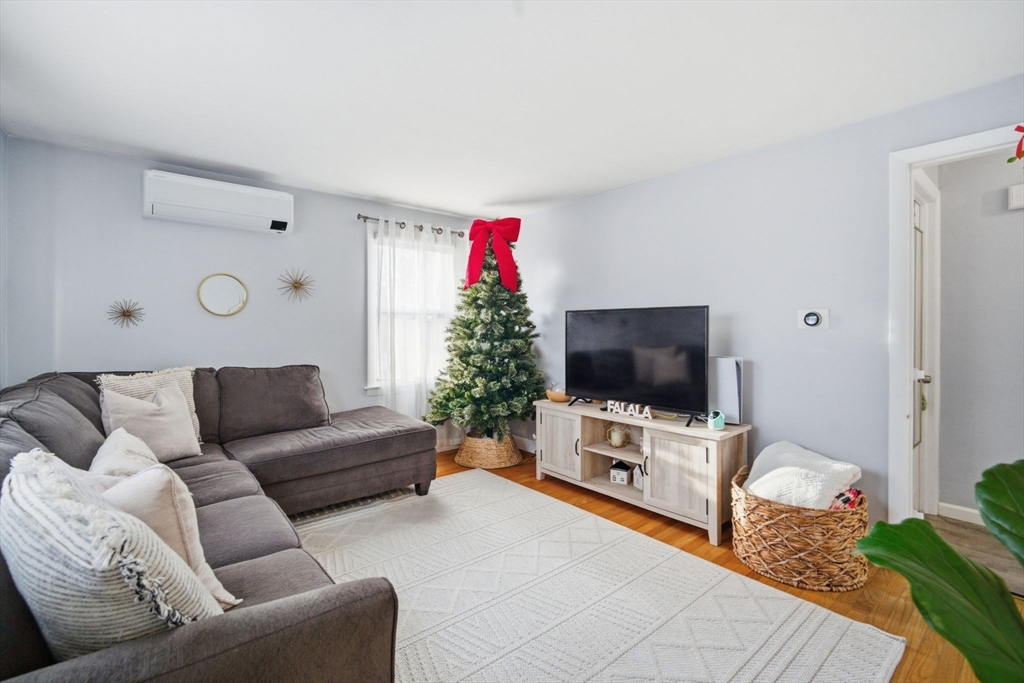 26 Cuff Avenue Springfield, MA 01104 - Photo 3 of 26 a living room with furniture and a flat screen tv