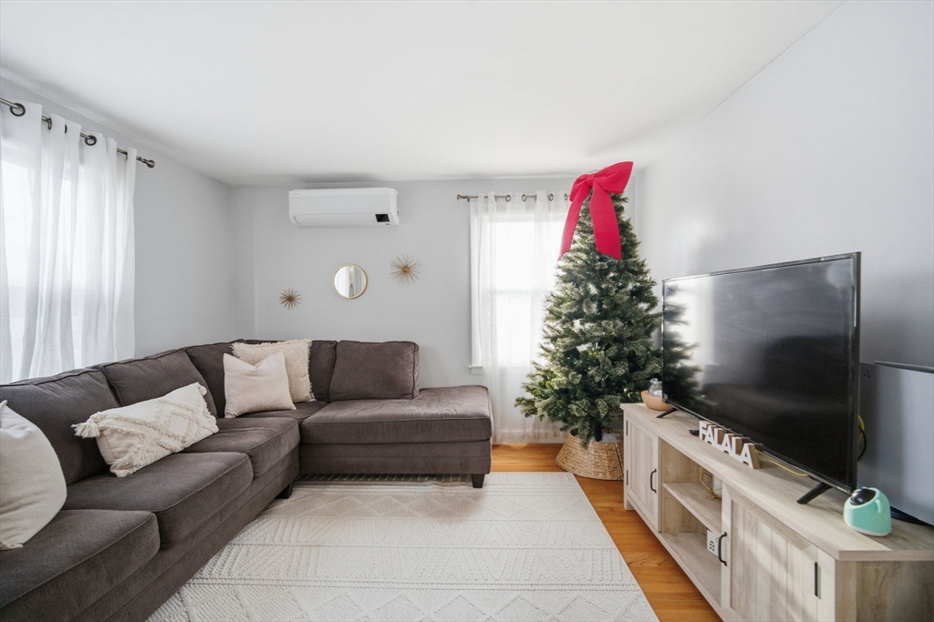 26 Cuff Avenue Springfield, MA 01104 - Photo 5 of 26 a living room with furniture and a flat screen tv