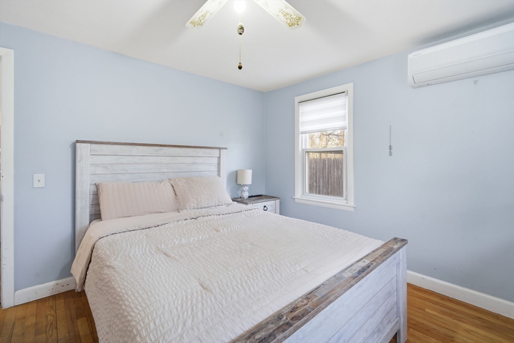 26 Cuff Avenue Springfield, MA 01104 - Photo 10 of 26 a bedroom with a bed and a window