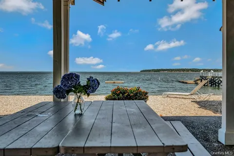 a view of a balcony with an ocean view