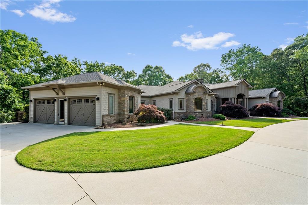 1447 Travis Smith Road Clarkesville, GA 30523 - Photo 16 of 73 a view of a house with a swimming pool and a yard
