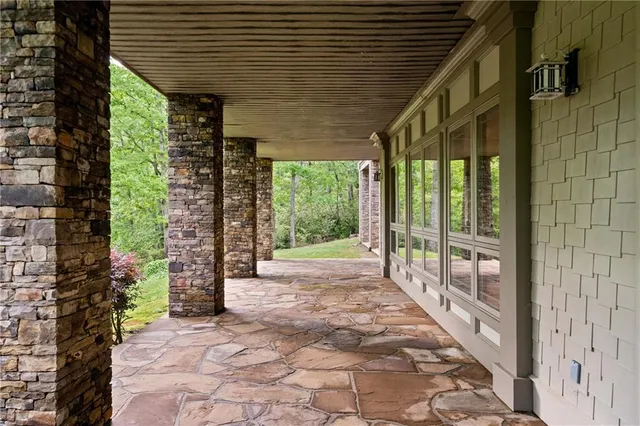 a bed room with a bed and a chandelier