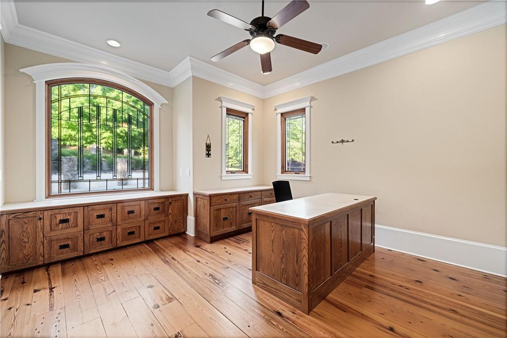 1447 Travis Smith Road Clarkesville, GA 30523 - Photo 45 of 73 a kitchen with stainless steel appliances granite countertop a sink a stove and a wooden floors