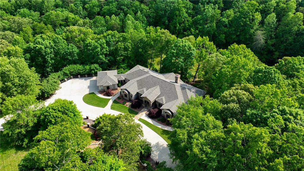 1447 Travis Smith Road Clarkesville, GA 30523 - Photo 60 of 73 an aerial view of a house with a yard