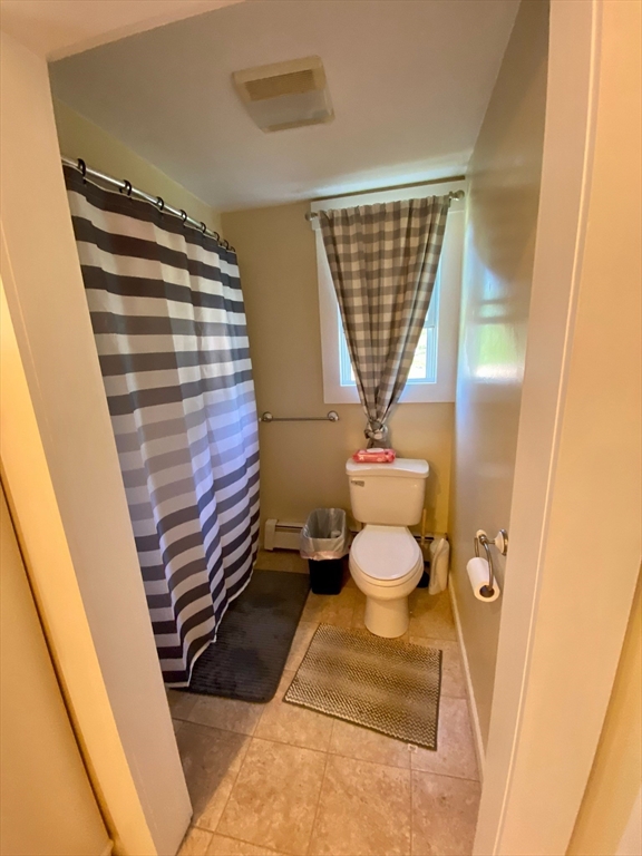 7 North Sturbridge Road Charlton, MA 01507 - Photo 16 of 42 a bathroom with a granite countertop toilet and a sink