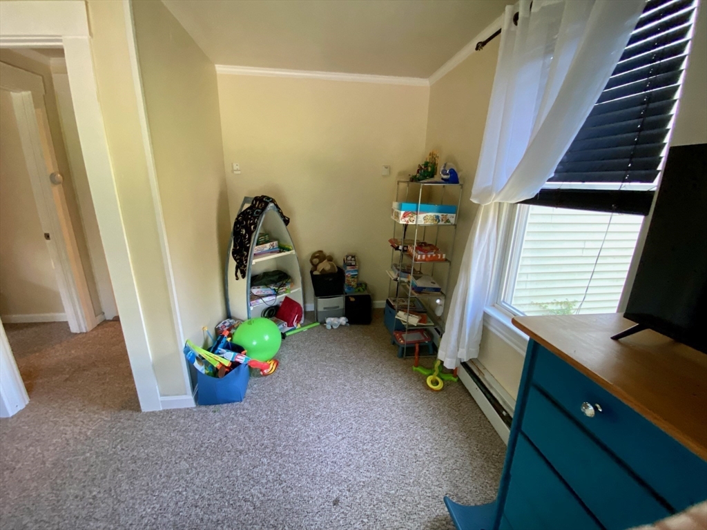 7 North Sturbridge Road Charlton, MA 01507 - Photo 18 of 42 a children room with toys and a window