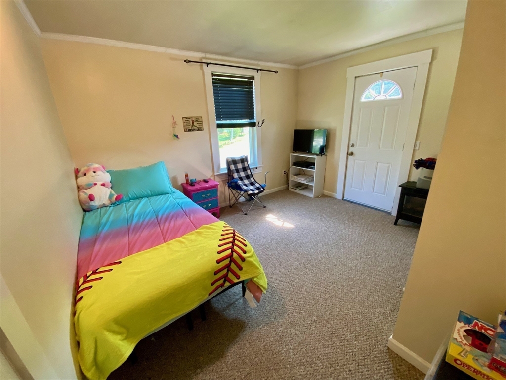 7 North Sturbridge Road Charlton, MA 01507 - Photo 20 of 42 a bedroom with bed and a window