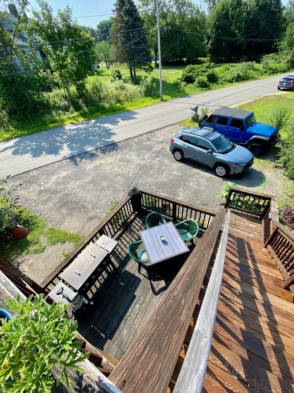 7 North Sturbridge Road Charlton, MA 01507 - Photo 23 of 42 a view of a wooden deck with furniture