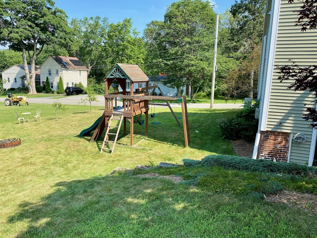 7 North Sturbridge Road Charlton, MA 01507 - Photo 41 of 42 a view of a house with a backyard