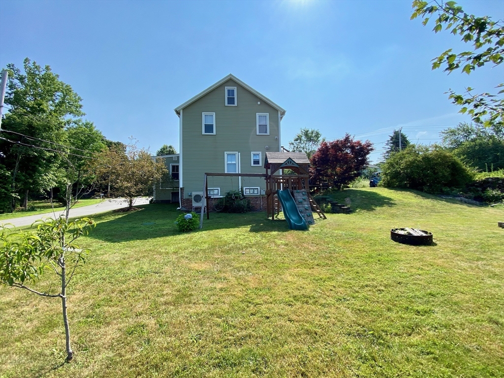 7 North Sturbridge Road Charlton, MA 01507 - Photo 5 of 42 a front view of a house with garden