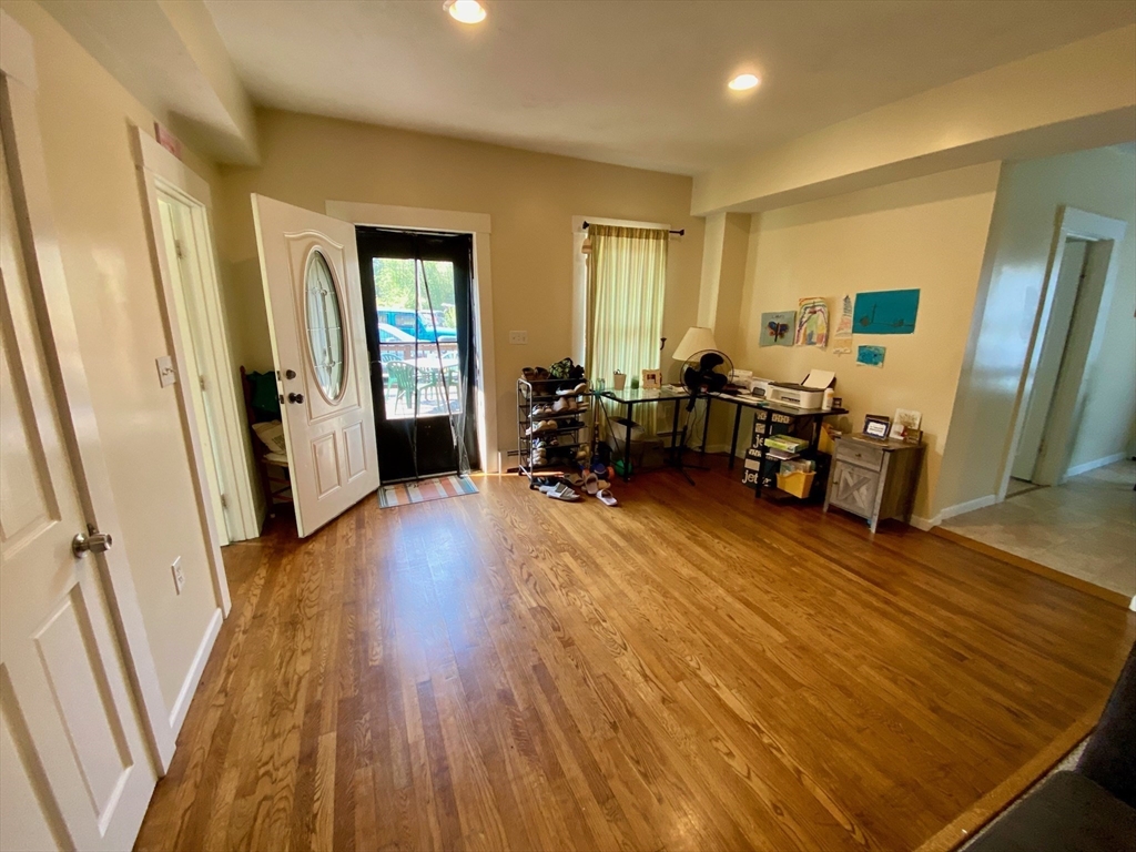 7 North Sturbridge Road Charlton, MA 01507 - Photo 6 of 42 a living room with furniture and a wooden floor